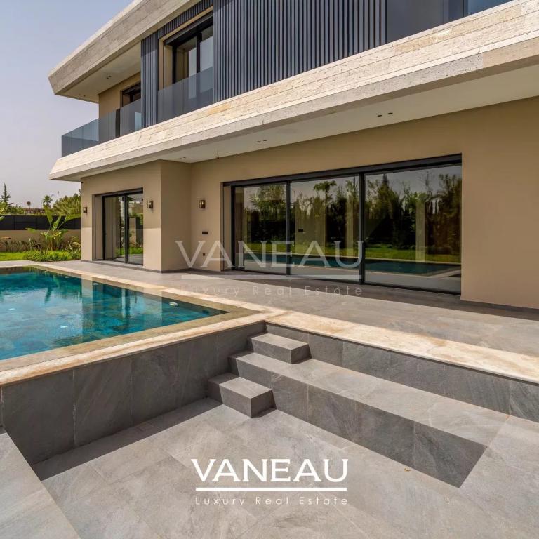 Villa de 500 m² habitable sur terrain arboré