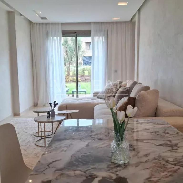 Superbe appartement 2 chambres avec jardin privatif de 100m² en 