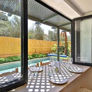 Appartement rdc avec avec piscine privée au coeur de l'Hivernage