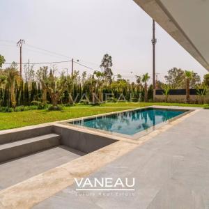 Villa de 500 m² habitable sur terrain arboré