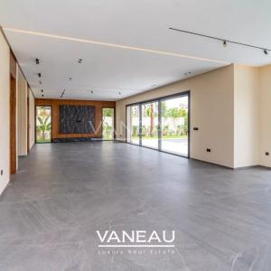 Villa de 500 m² habitable sur terrain arboré