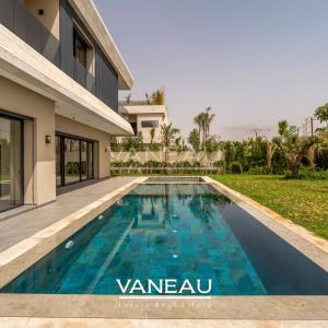 Villa de 500 m² habitable sur terrain arboré