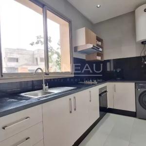 Superbe appartement 2 chambres avec jardin privatif de 100m² en 