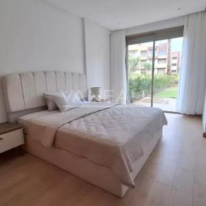 Superbe appartement 2 chambres avec jardin privatif de 100m² en 