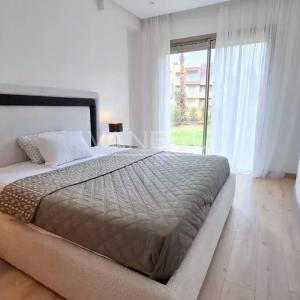 Superbe appartement 2 chambres avec jardin privatif de 100m² en 