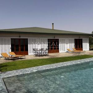 **À Vendre : Maison d’Exception au Bord du Lac de Lalla Takerkou