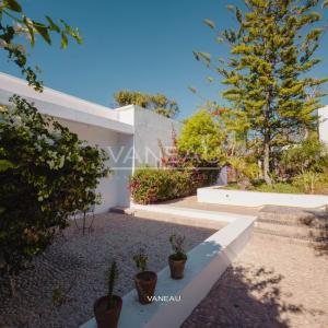 ***Maisons face à la lagune avec piscine***