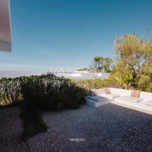 ***Maisons face à la lagune avec piscine***
