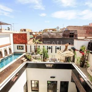 MARRAKECH MAISON D'HÔTES DE 7 CHAMBRES PISCINE SUR LA TERRASSE À VENDR