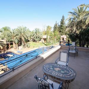 VILLA ARABO-ANDALOUS À VENDRE DANS LA PALMERAIE DE MARRAKECH