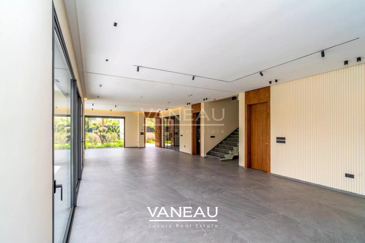 Villa de 500 m² habitable sur terrain arboré