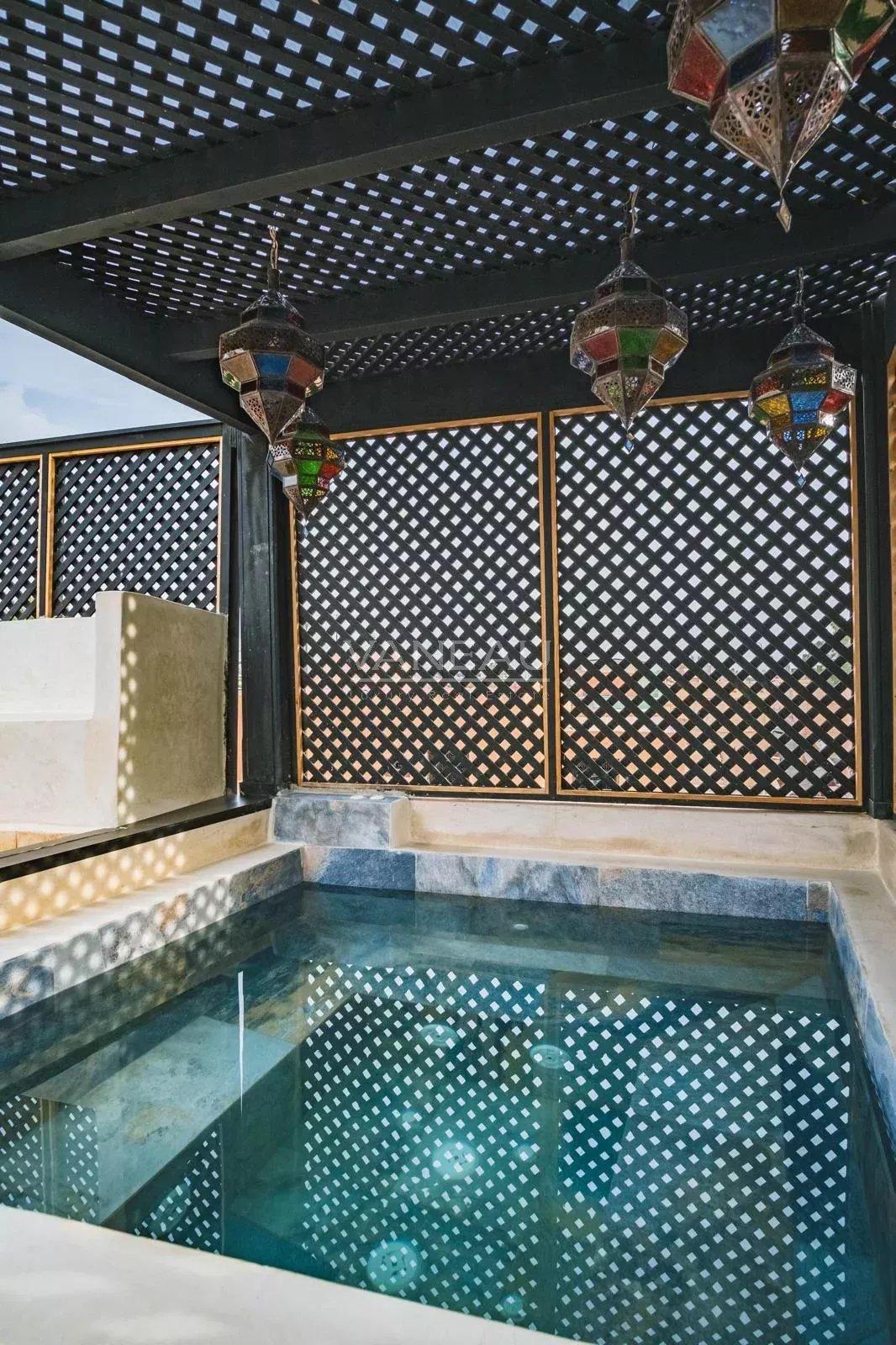 Riad trois chambres avec bassin et vue Koutoubia