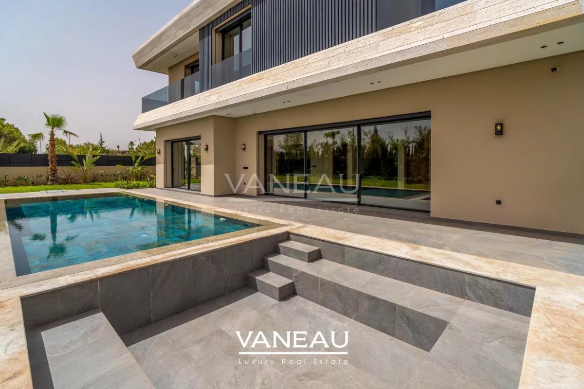 Villa de 500 m² habitable sur terrain arboré