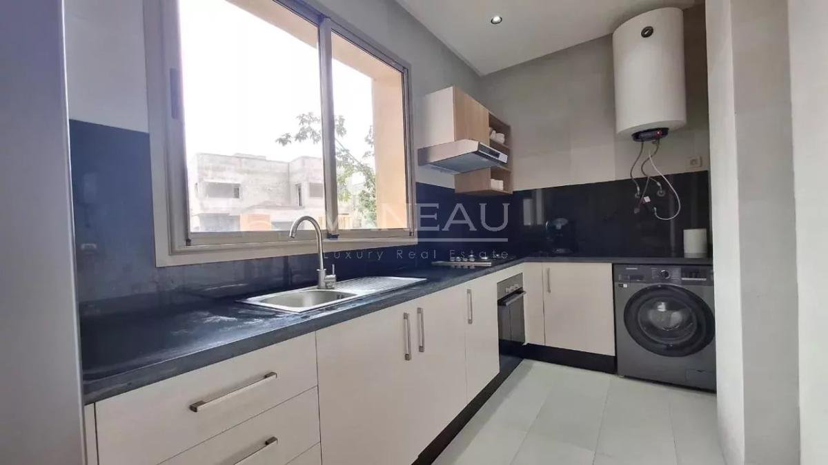 Superbe appartement 2 chambres avec jardin privatif de 100m² en 